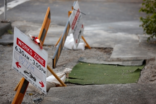 Workzone signage and construction on pavement - Australian Stock Image