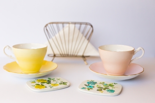 Yellow and pink vintage tea cups - Australian Stock Image