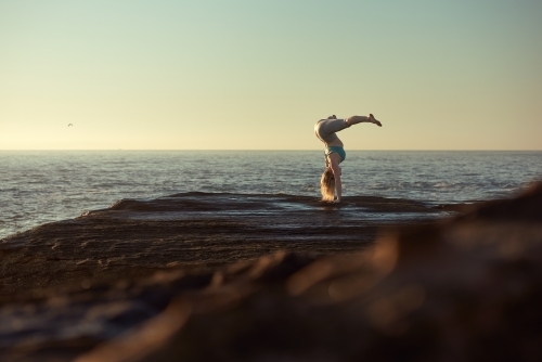 Yoga woman ocean - Australian Stock Image