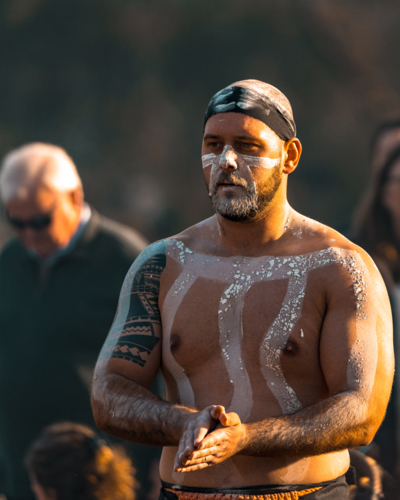 Young Aboriginal Male preparing for dance - Australian Stock Image