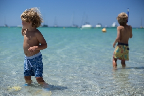 Young boys playing at beach - Australian Stock Image
