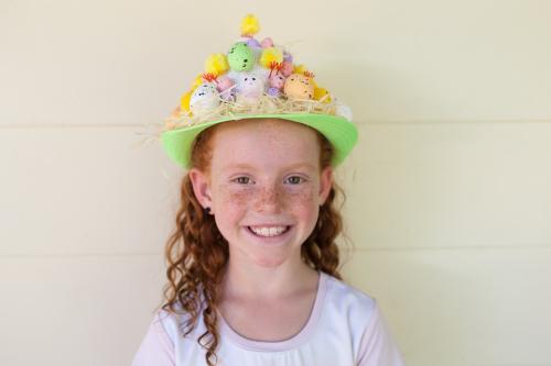 Young girl wearing an Easter hat - Australian Stock Image