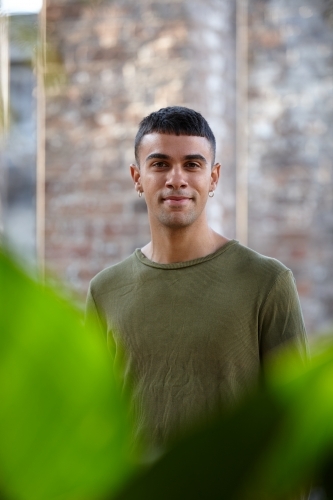 Young Indigenous Australian man enjoying time outdoors - Australian Stock Image