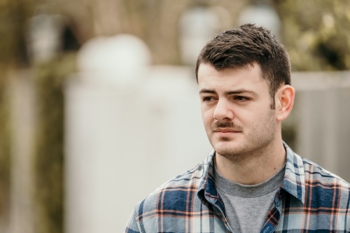 Young man in street. - Australian Stock Image