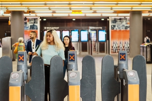 young students at the train station - Australian Stock Image