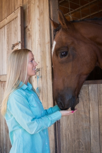 Young Woman and Her Horse - Australian Stock Image