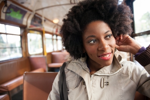 Young Woman Riding on the Tram - Australian Stock Image