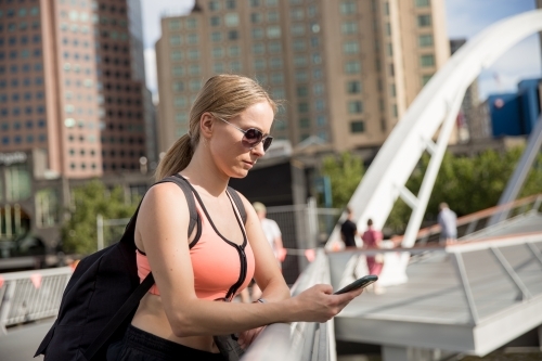 Young Woman Waiting for Friends for Workout - Australian Stock Image